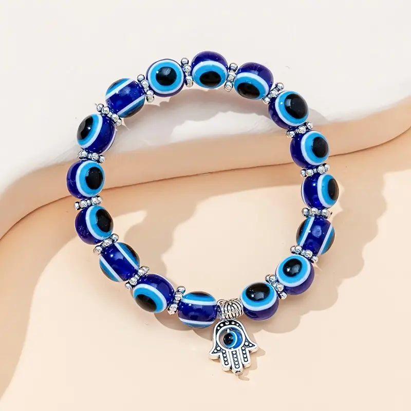 Pulsera de cuentas de ojo malvado azul con dije de mano, estilo bohemio, joyería elástica ajustable para protección y buena suerte.